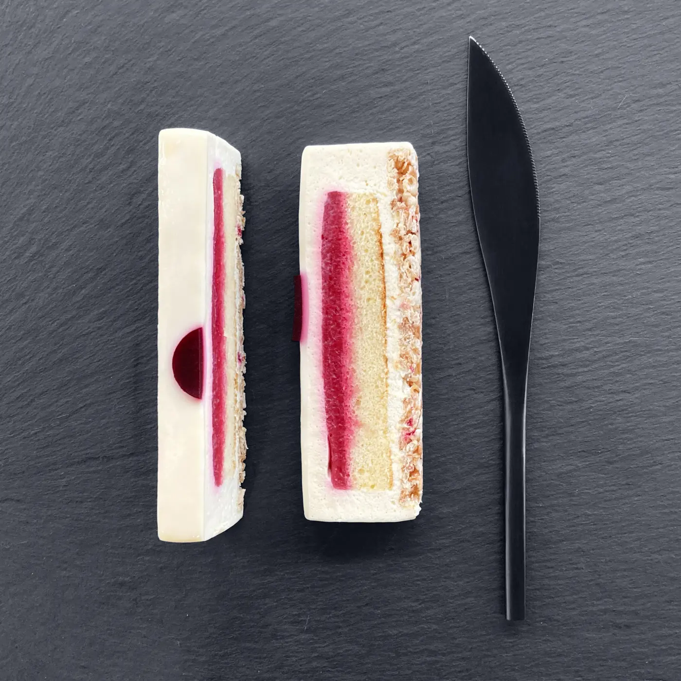 A sakura entremet, sliced on slate